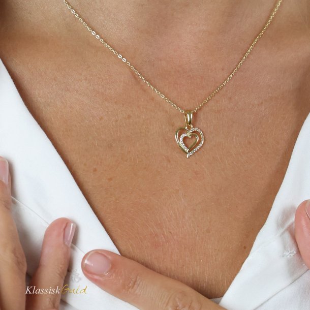 14 kt. Guldhjerte - dobbelt med 27 diamanter