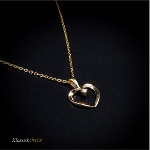 14 kt. Guldhjerte - med 0,025 ct. diamant