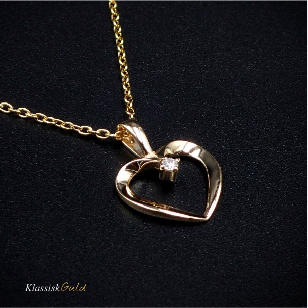 14 kt. Guldhjerte - med 0,025 ct. diamant