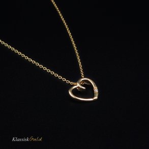 14 kt. Guldhjerte - med 0,009 ct. diamant